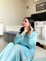Aqua Silk Sharara Set by MONA featuring a three-piece design with intricate detailing and flowing silhouette.